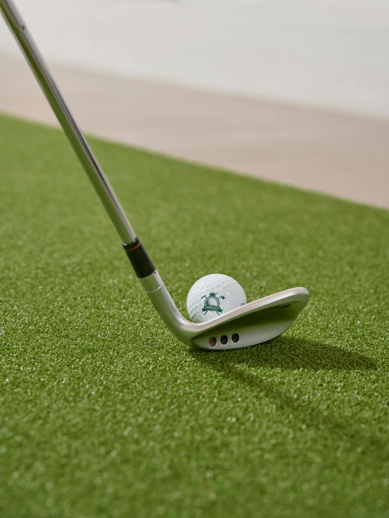 Ball near putter